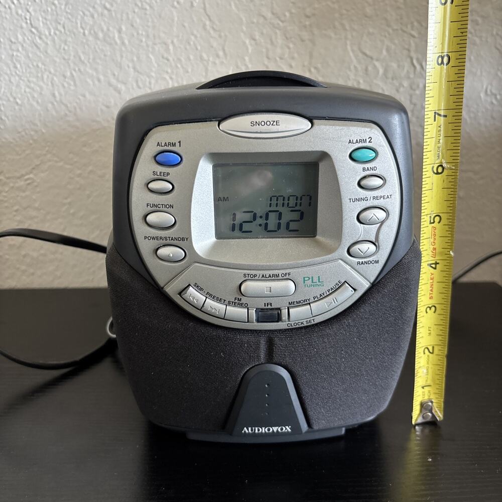 Audiovox CD1167 dual alarm clock radio with a digital display - Tested Working